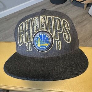 New Era Golden State Warriors Championship hat.